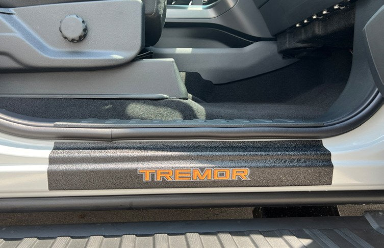 F-150 2021-2027 DOOR SILL KIT TREMOR LOGO BY TUFSKINZ ON BLACK TEXTURE